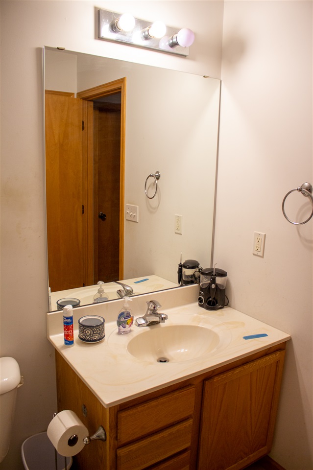 426 Lockwood Road Davis, IL 61019 - Photo 16 of 25 a bathroom with a sink and a mirror