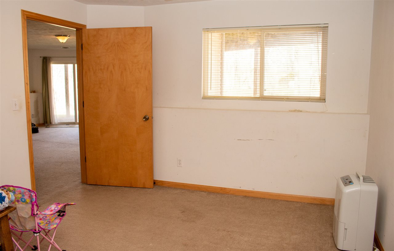 426 Lockwood Road Davis, IL 61019 - Photo 20 of 25 a view of an empty room with a window