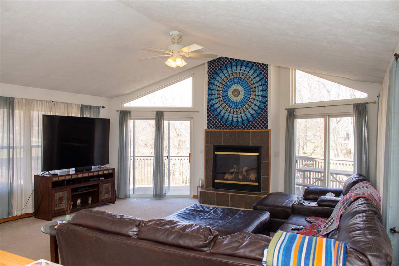 426 Lockwood Road Davis, IL 61019 - Photo 3 of 25 a living room with furniture and a flat screen tv