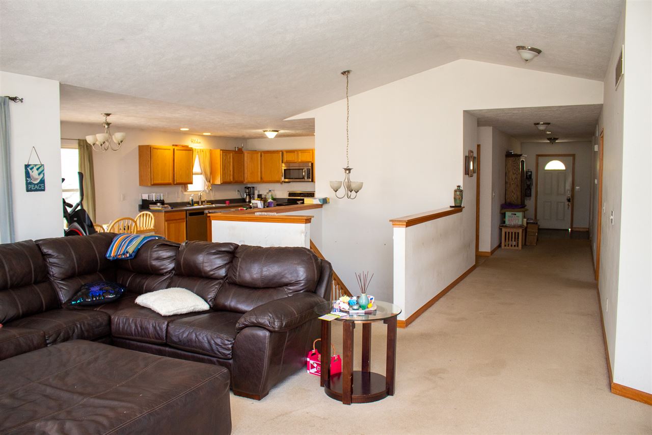 426 Lockwood Road Davis, IL 61019 - Photo 6 of 25 a living room with furniture and kitchen view