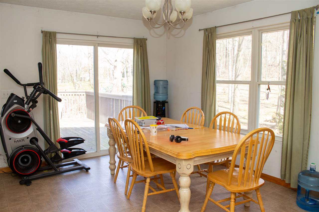 426 Lockwood Road Davis, IL 61019 - Photo 9 of 25 a view of a dining room with furniture window and outside view