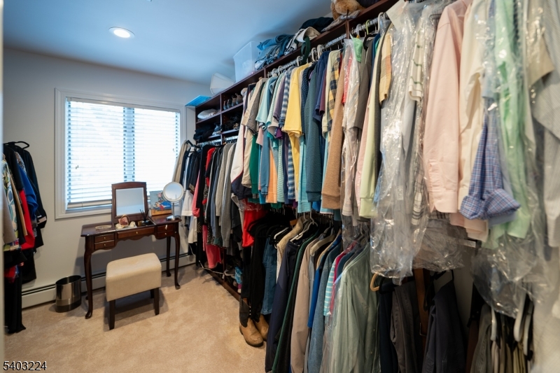 33 Ward Road Blairstown, NJ 07825 - Photo 35 of 49 a view of walk in closet with clothes and shoes