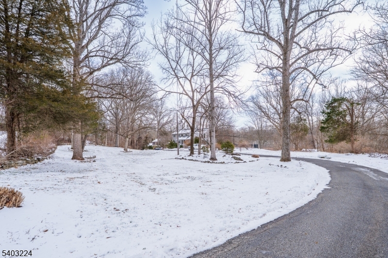 33 Ward Road Blairstown, NJ 07825 - Photo 44 of 49 a view of a house with snow on the road
