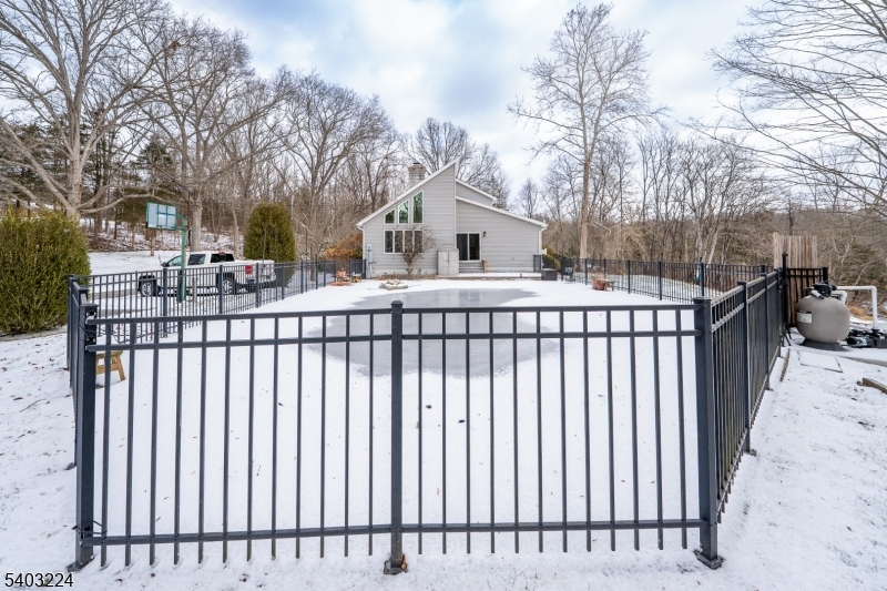 33 Ward Road Blairstown, NJ 07825 - Photo 45 of 49 a view of a house with a wooden fence
