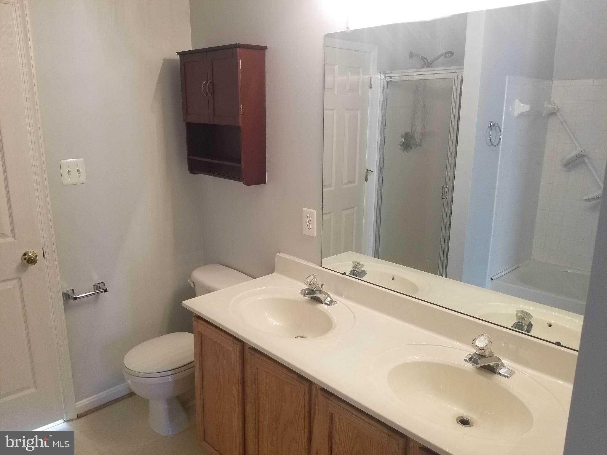 603 Hollowstone Road Frederick, MD 21703 - Photo 22 of 26 Upper level bedroom with double vanity