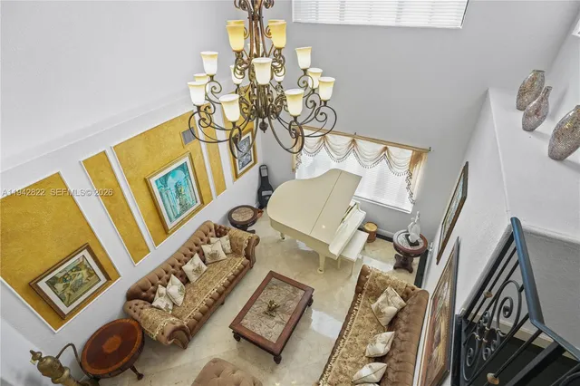 a view of a chairs and table in the patio