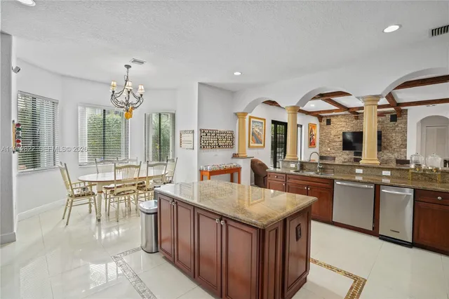 a view of swimming pool with outdoor seating