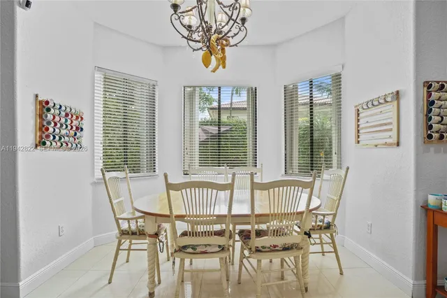 a room with gym equipment and a large window