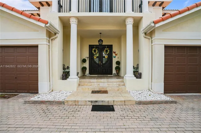 a view of a entryway door front of house