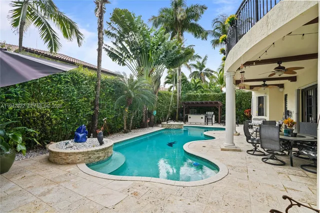 a view of a gym room with gym equipment