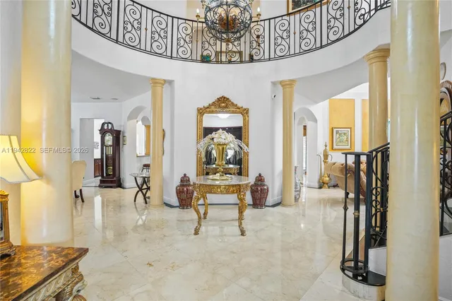 a bathroom with a toilet and a mirror