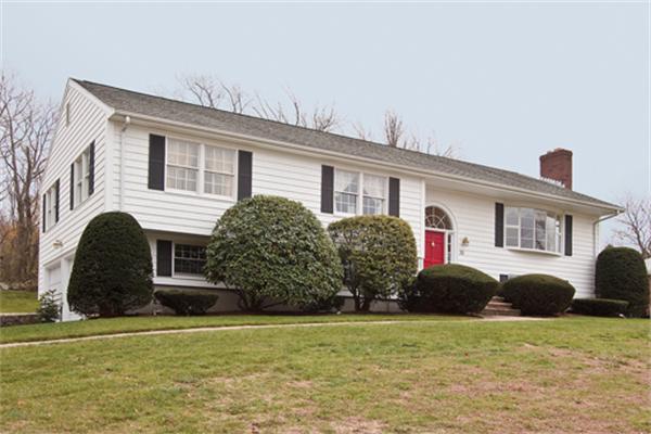 32 Mayflower Road Winchester, MA 01890 - Photo 1 of 1 a front view of a house with a garden