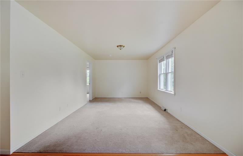 343 Glass Road New Castle, PA 16101 - Photo 22 of 25 28x10 living room in the apartment give plenty of space.