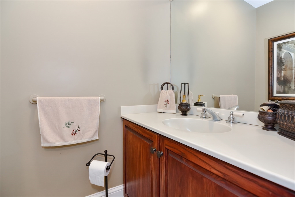 207 Lawrence Road Medford, MA 02155 - Photo 23 of 42 a bathroom with a sink and a mirror