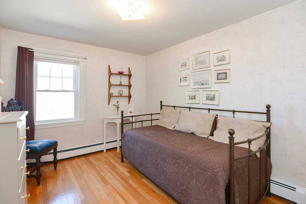 207 Lawrence Road Medford, MA 02155 - Photo 39 of 42 a living room with furniture and a window