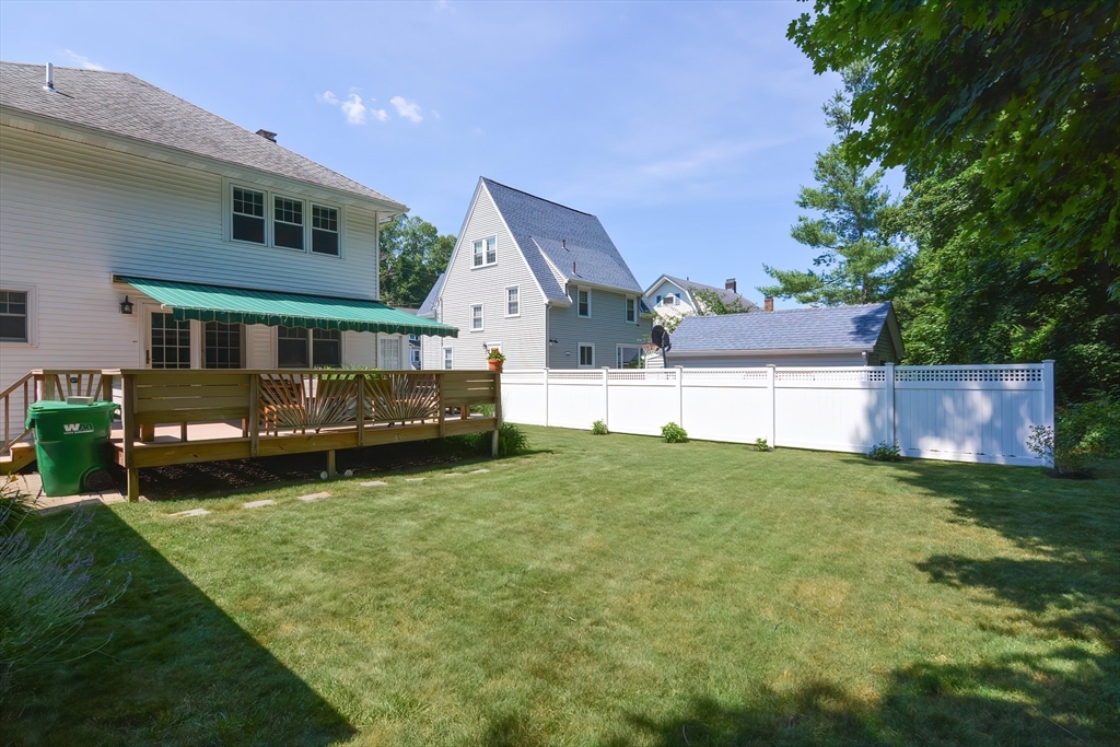 207 Lawrence Road Medford, MA 02155 - Photo 4 of 42 a house view with a garden space