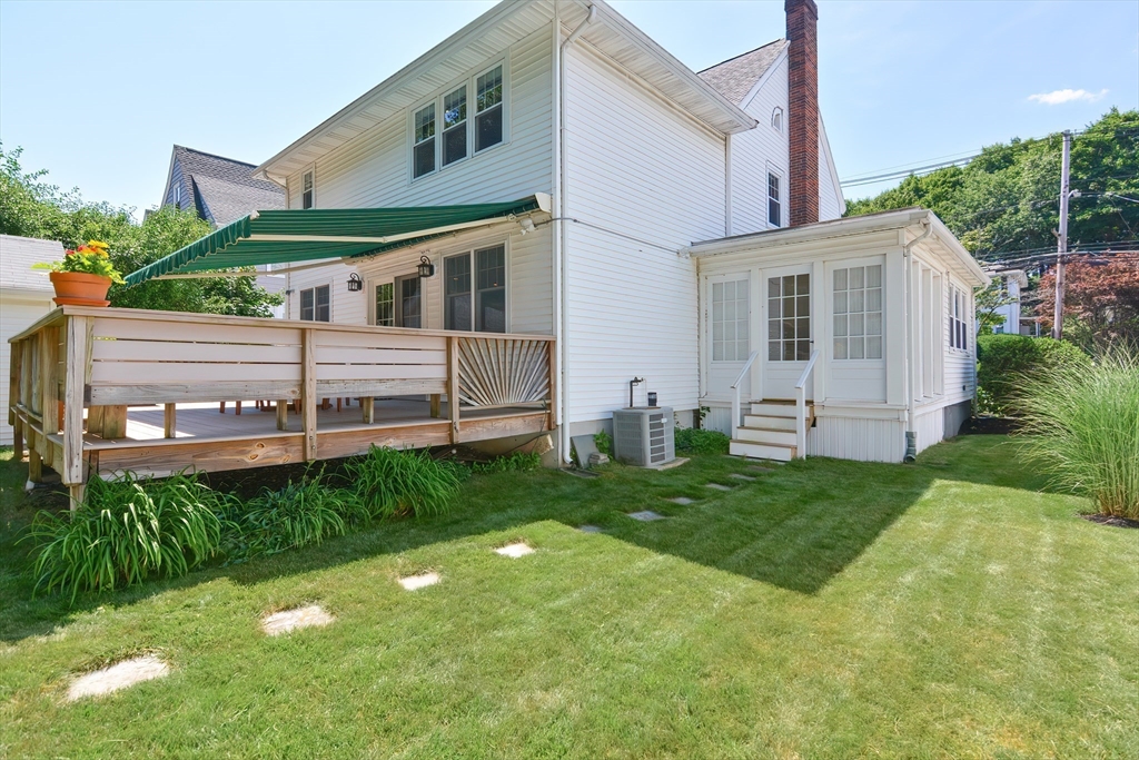 207 Lawrence Road Medford, MA 02155 - Photo 6 of 42 a front view of house with yard and green space