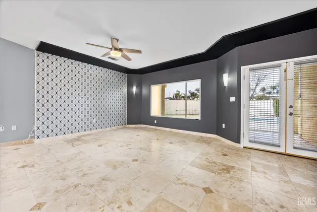 a view of empty room with windows