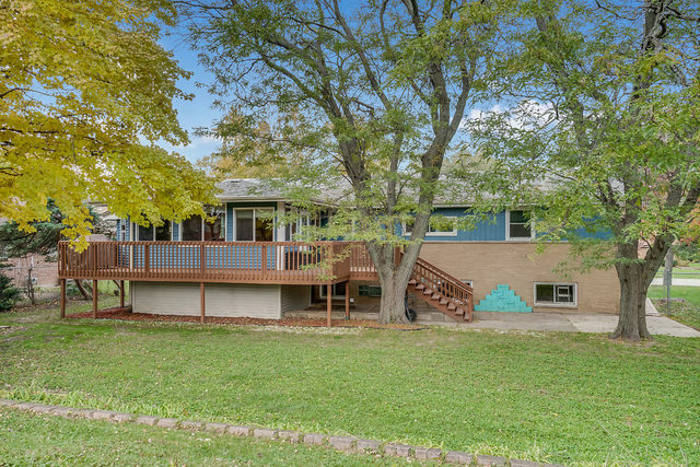 59 Neil Road Sugar Grove, IL 60554 - Photo 2 of 22 a view of a house with a yard