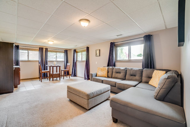 59 Neil Road Sugar Grove, IL 60554 - Photo 16 of 22 a living room with furniture and a window