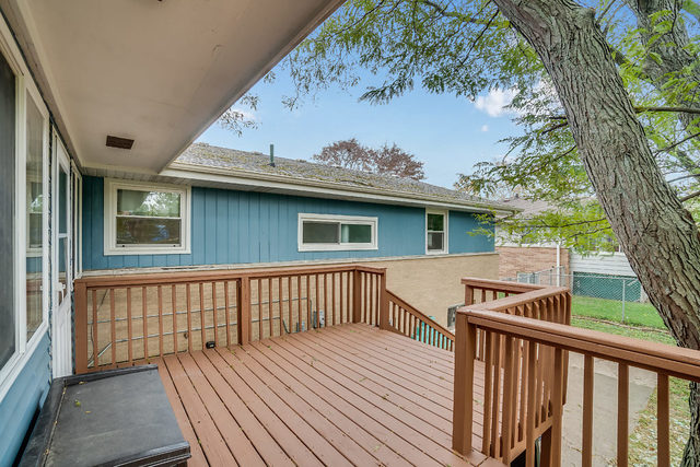 59 Neil Road Sugar Grove, IL 60554 - Photo 20 of 22 a view of a wooden deck and a yard with wooden fence