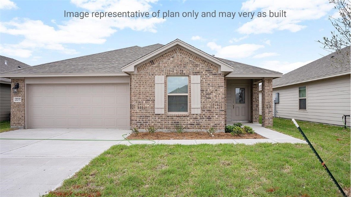 1411 Choctaw Road Sinton, TX 78387 - Photo 1 of 28 a front view of a house with garden