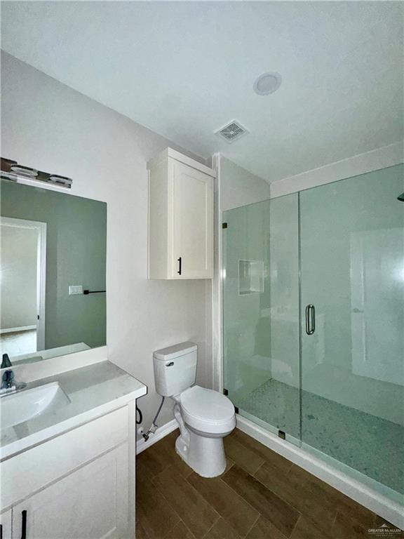 716 Ragland Road, Unit 8 Mission, TX 78572 - Photo 11 of 19 a bathroom with a toilet sink and shower