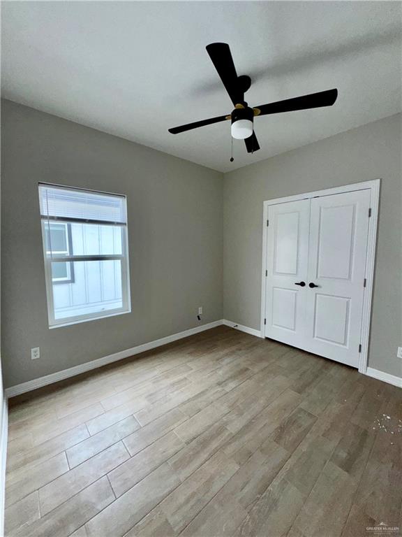 716 Ragland Road, Unit 8 Mission, TX 78572 - Photo 16 of 19 a view of an empty room with a window