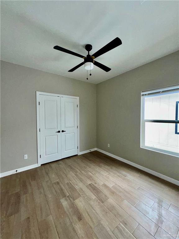 716 Ragland Road, Unit 8 Mission, TX 78572 - Photo 18 of 19 a view of an empty room with a window