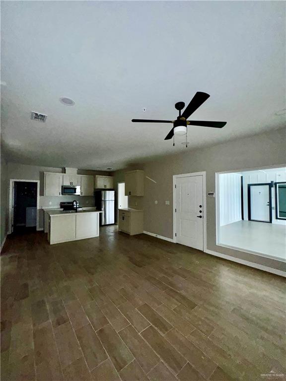 716 Ragland Road, Unit 8 Mission, TX 78572 - Photo 5 of 19 a view of a livingroom with a ceiling fan and window