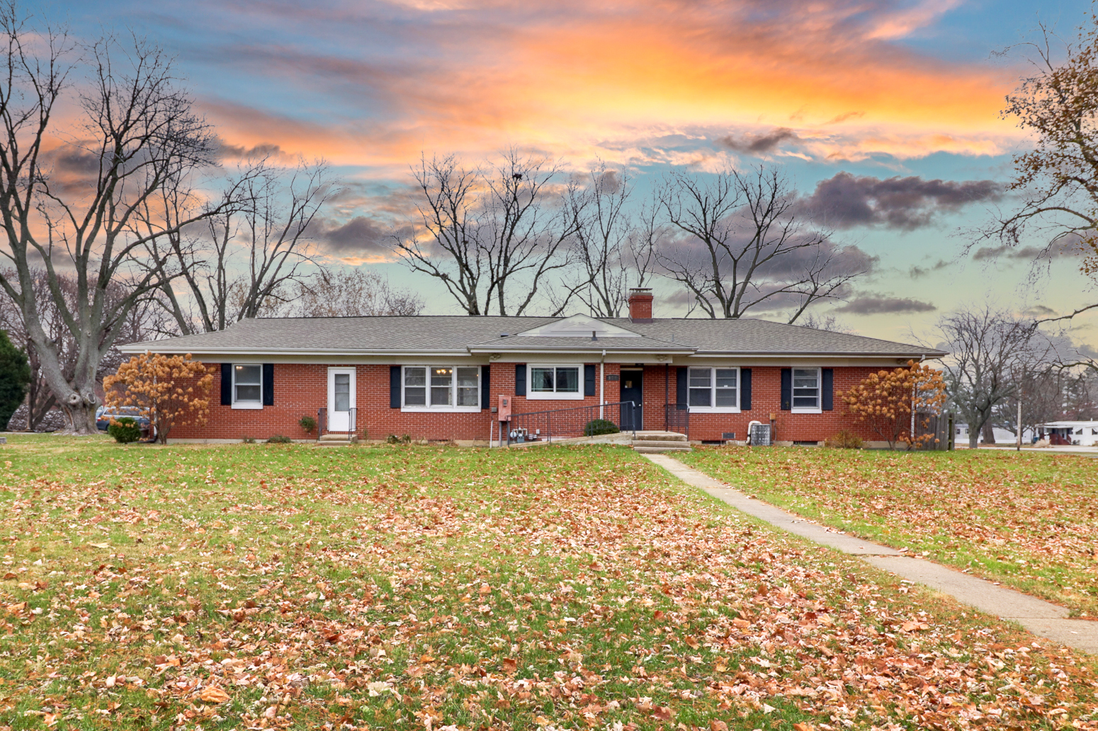 a view of a yard in front of a house