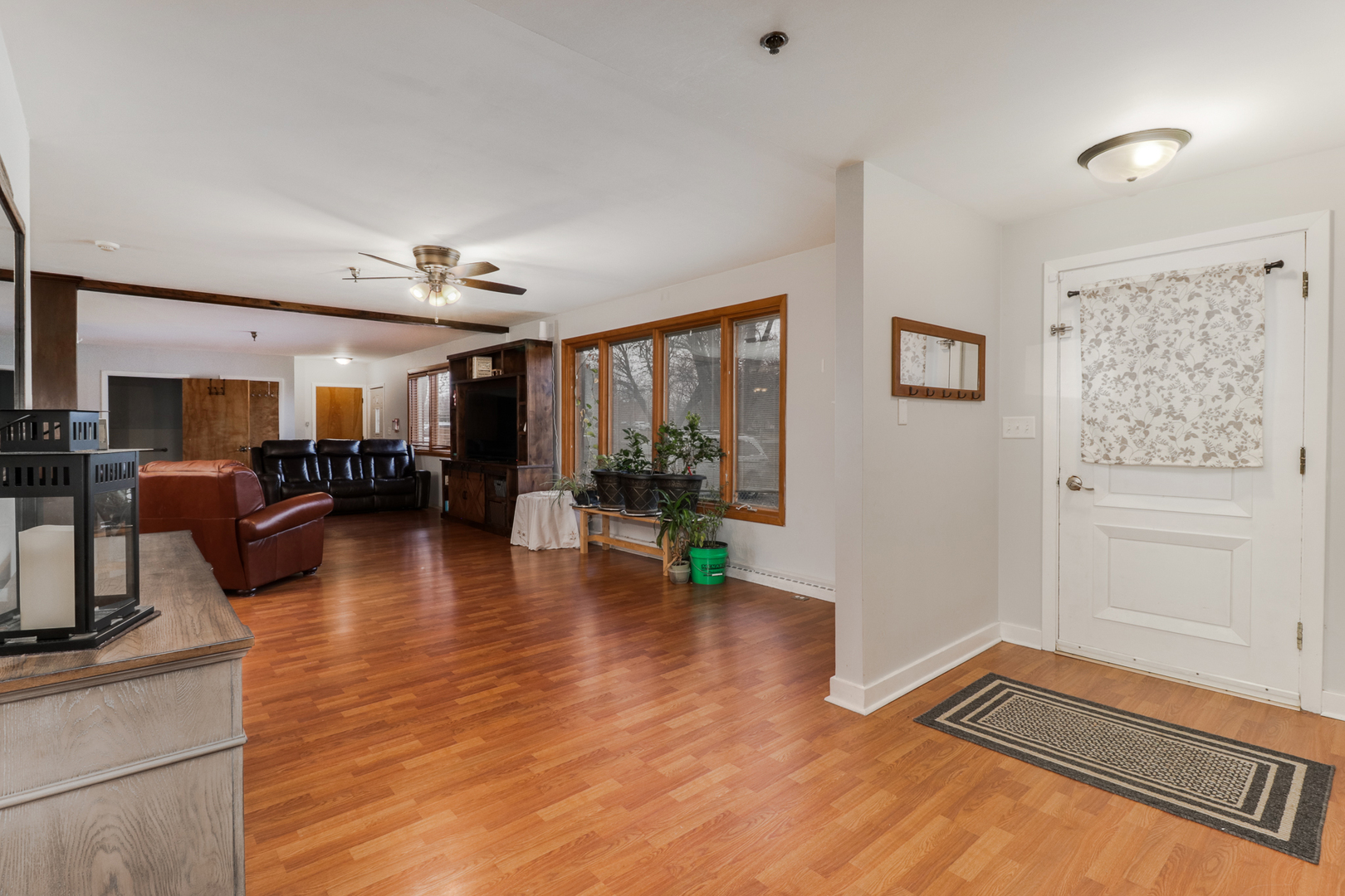 900 Beech Street Normal, IL 61761 - Photo 2 of 36 a living room with furniture and a large window