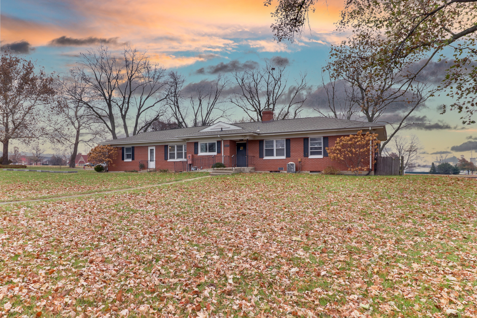 900 Beech Street Normal, IL 61761 - Photo 15 of 36 front view of a house with a garden