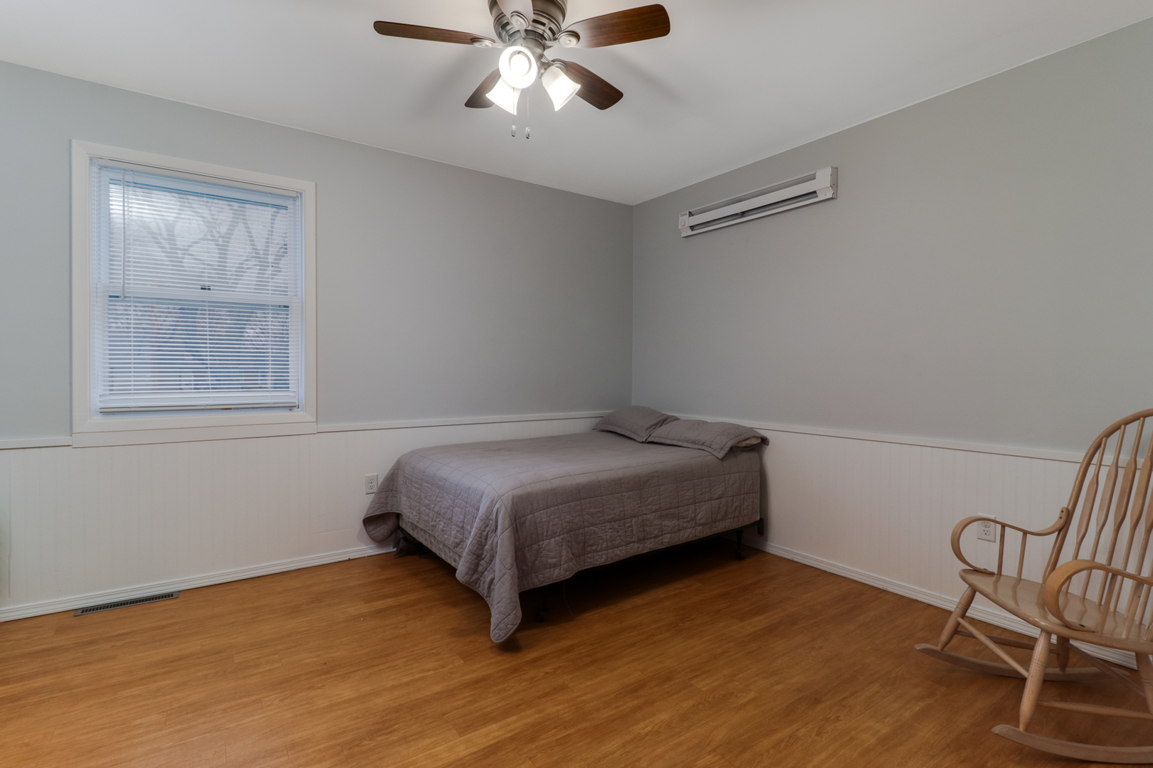 900 Beech Street Normal, IL 61761 - Photo 27 of 36 a bedroom with a bed and a window