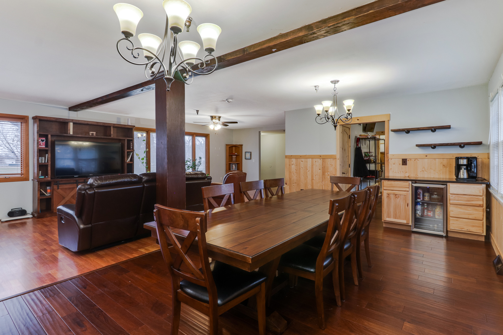 900 Beech Street Normal, IL 61761 - Photo 4 of 36 a view of a dining room with furniture wooden floor and chandelier