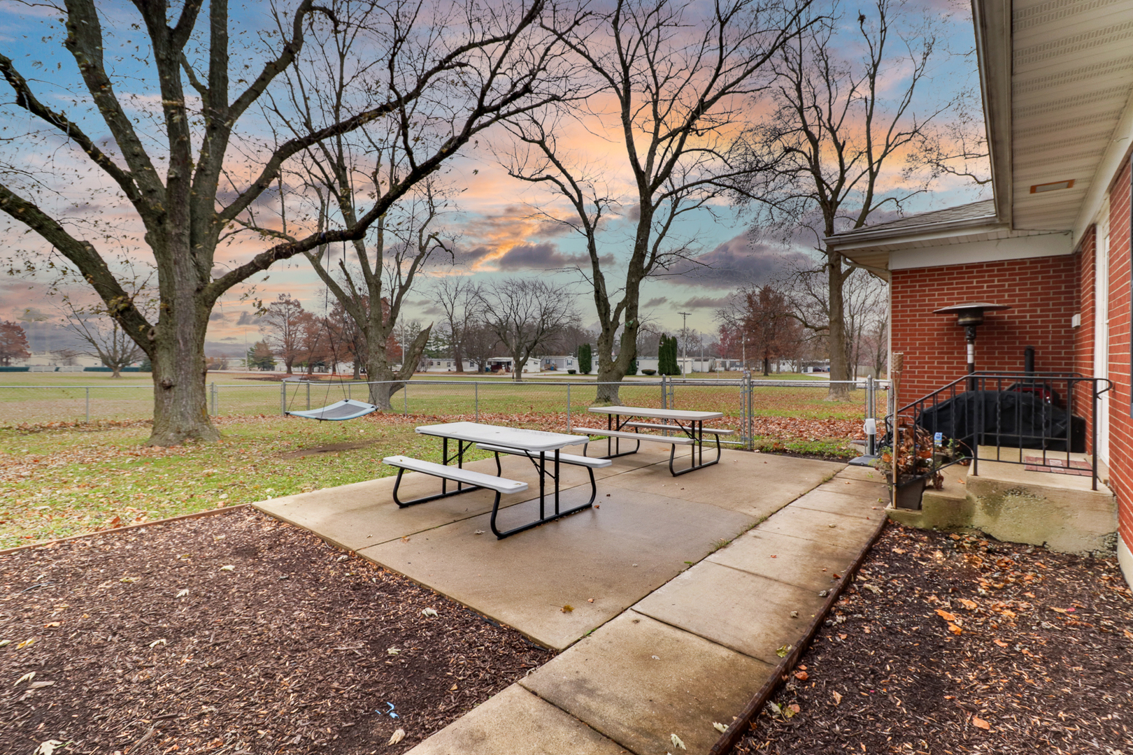 900 Beech Street Normal, IL 61761 - Photo 7 of 36 a view of a park with bench and trees