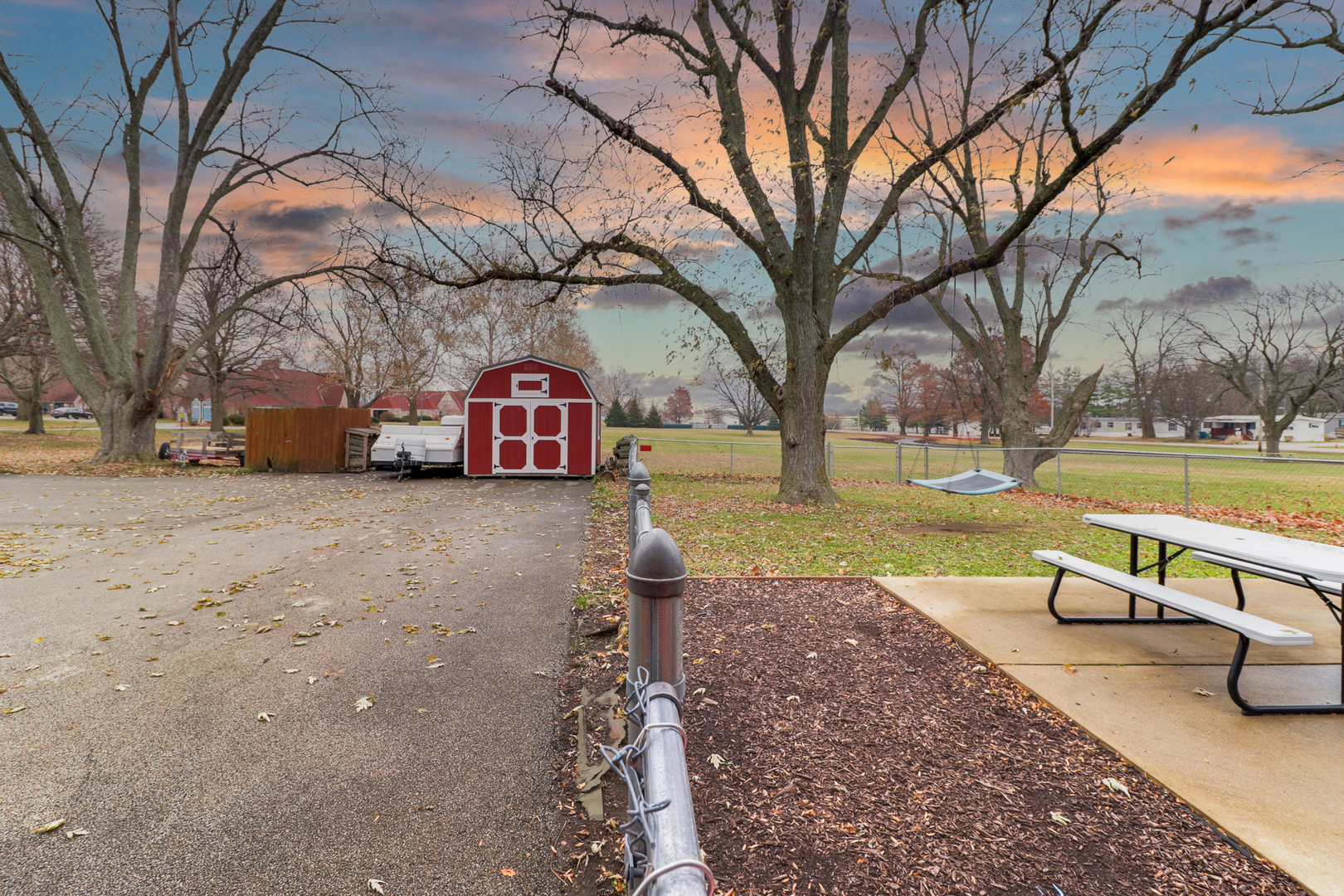900 Beech Street Normal, IL 61761 - Photo 8 of 36 a view of a park with large trees