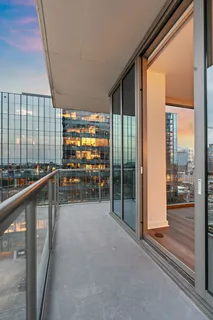 a view of a balcony with city view