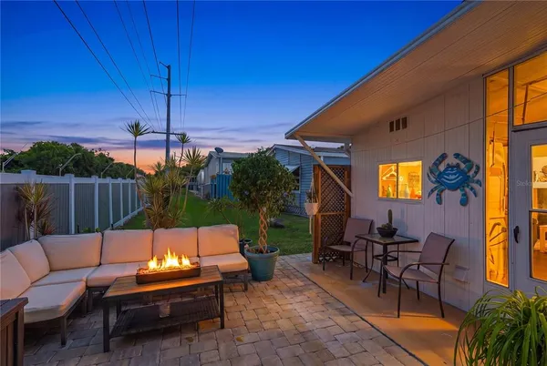 a outdoor living space with furniture and city view