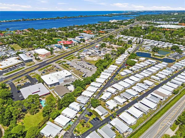 an aerial view of a house with outdoor space