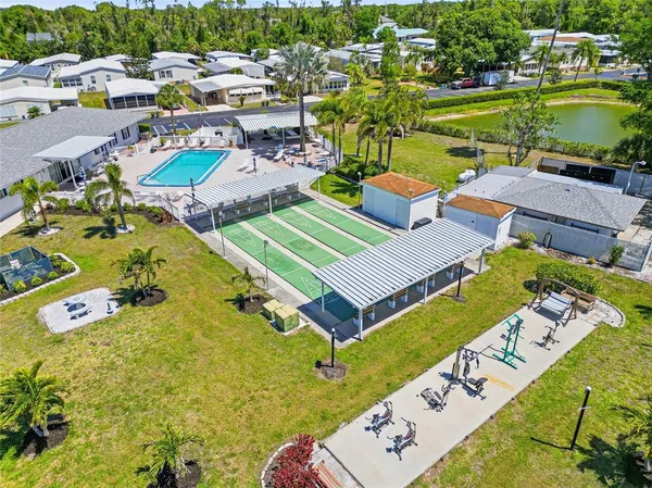 an aerial view of a house with a ocean view