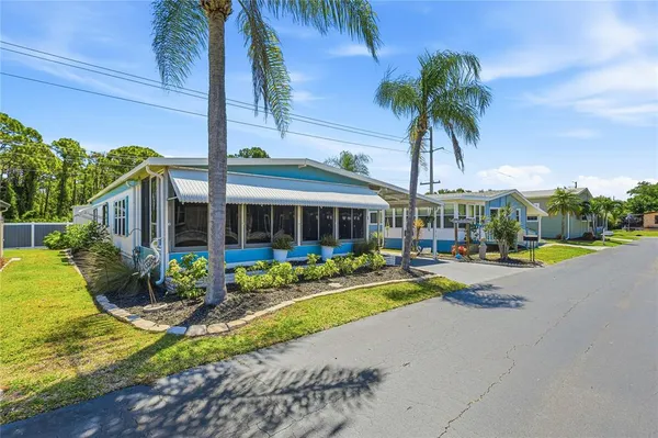 a house with swimming pool in front of it