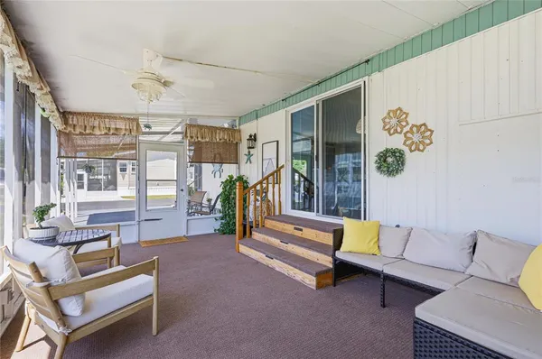 a bedroom with furniture and a couch