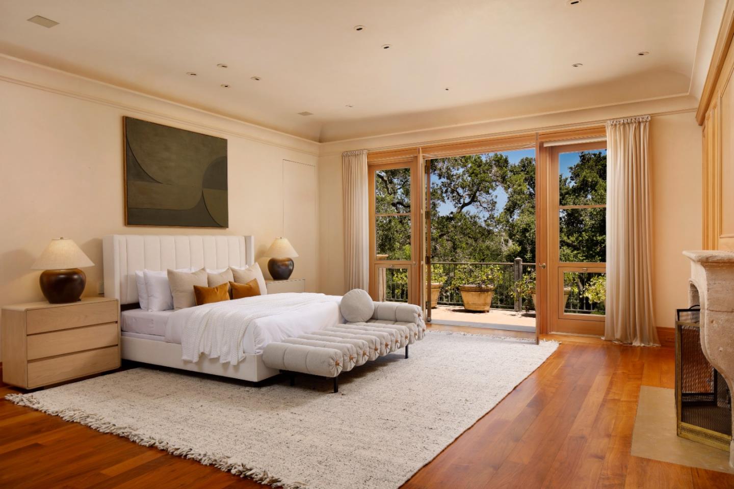 211 Winding Way Woodside, CA 94062 - Photo 17 of 32 a bedroom with a bed and large windows