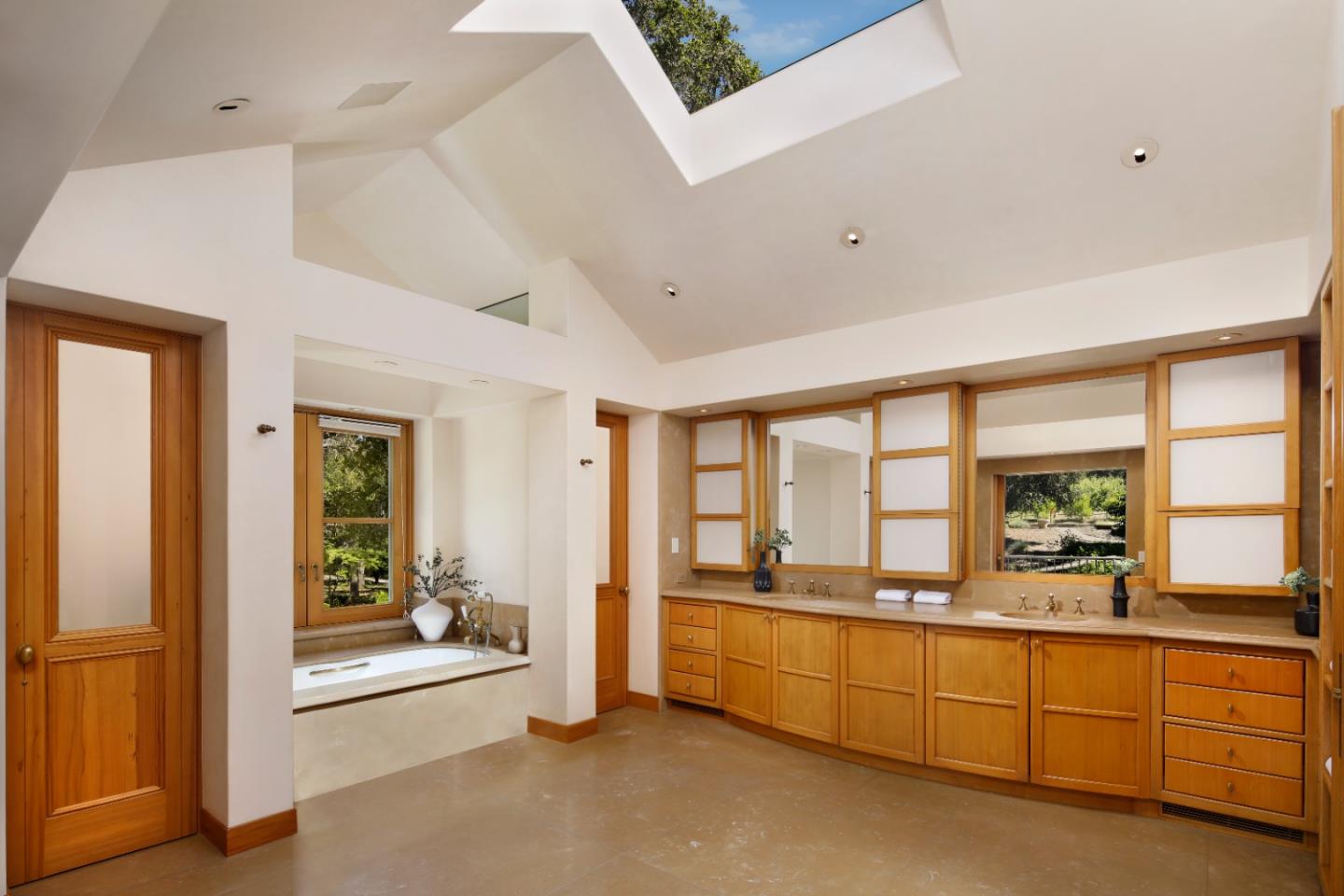 211 Winding Way Woodside, CA 94062 - Photo 18 of 32 a large white room with a large window and pool table