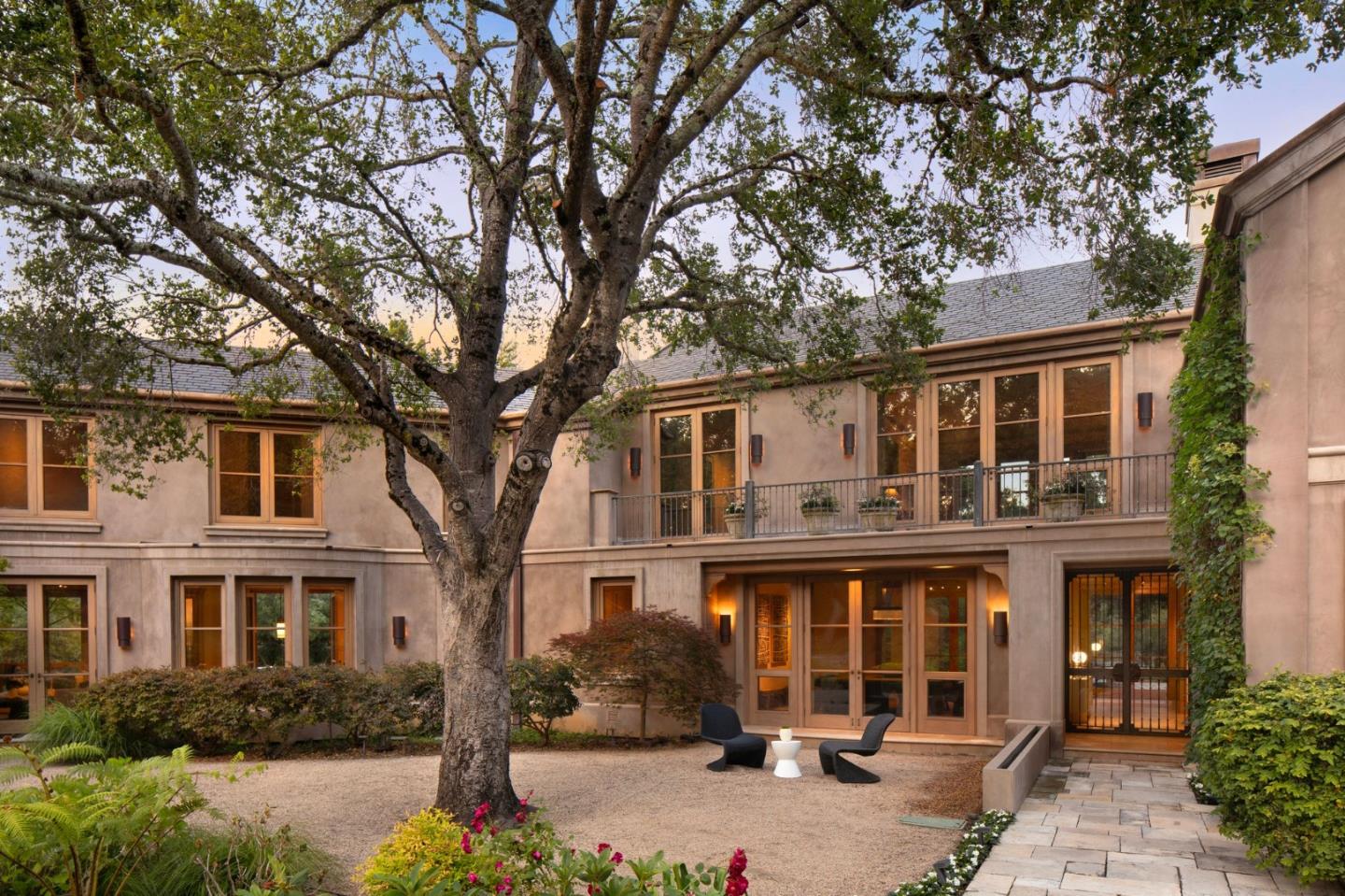 211 Winding Way Woodside, CA 94062 - Photo 2 of 32 a front view of a house with garden