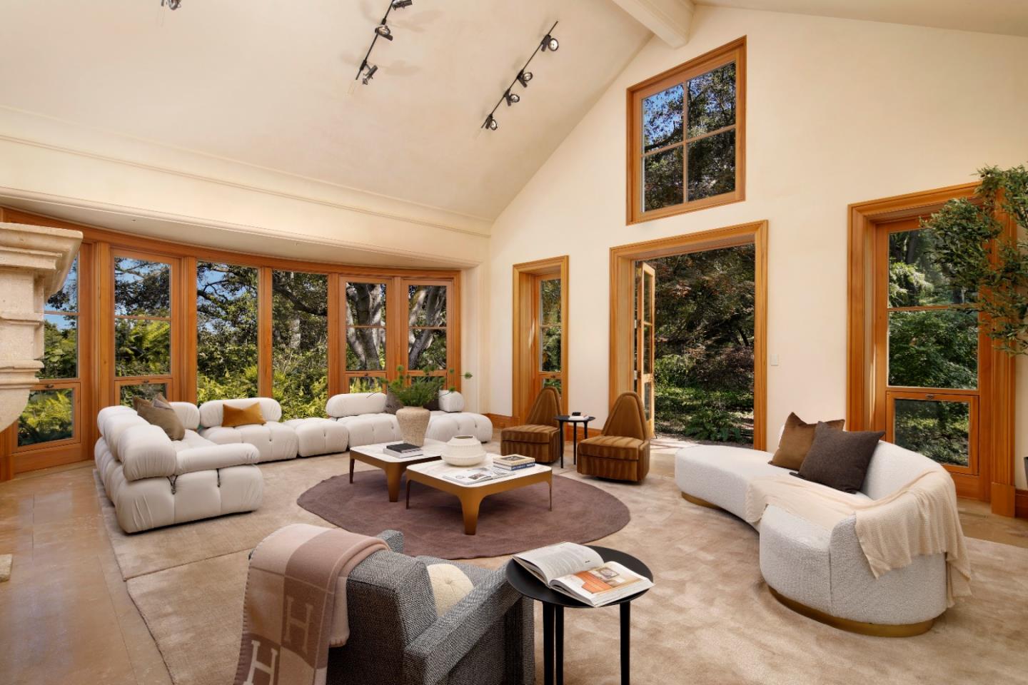 211 Winding Way Woodside, CA 94062 - Photo 5 of 32 a living room with furniture and large windows