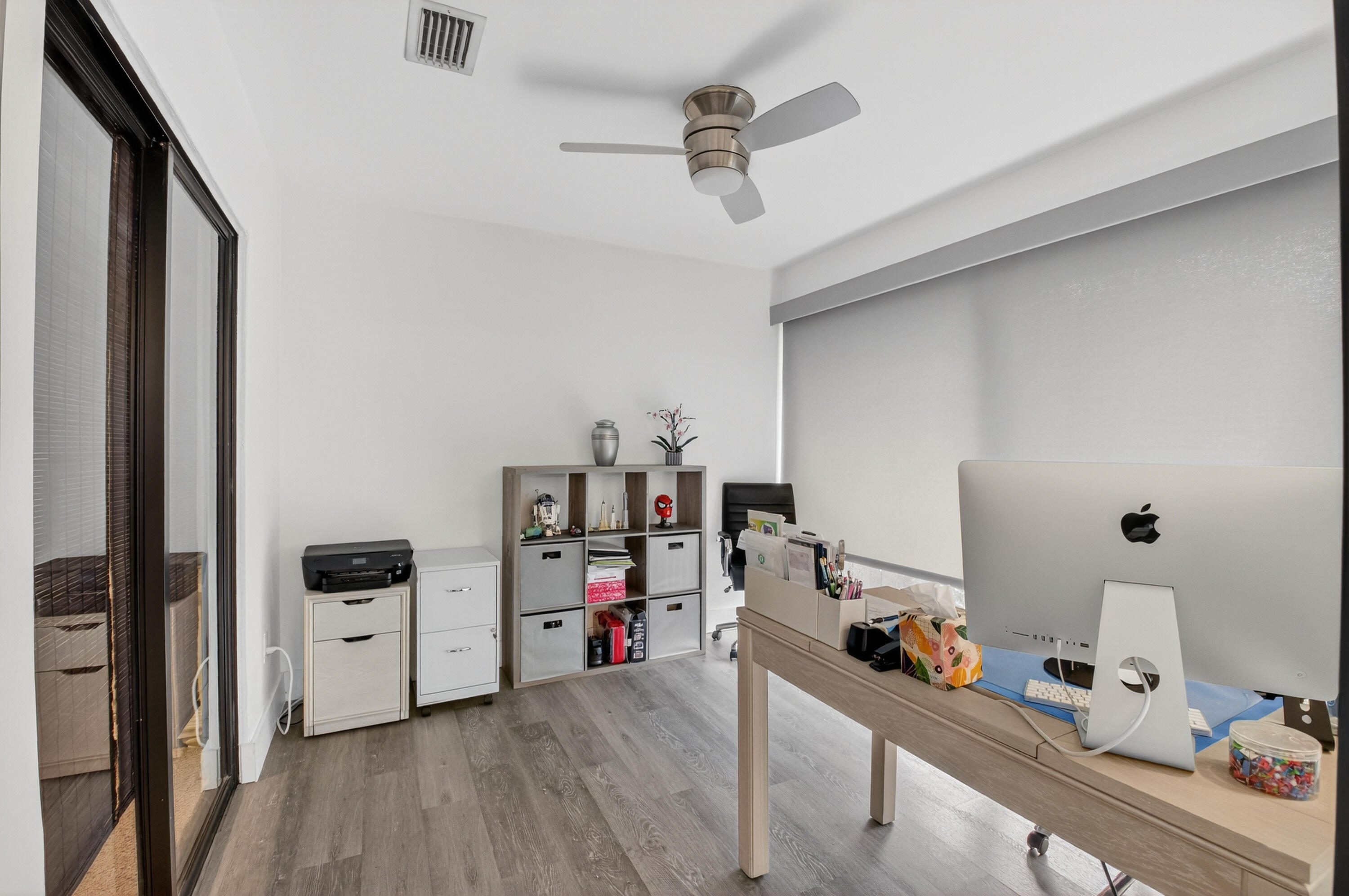 8136 Whispering Palm Drive, Unit B Boca Raton, FL 33496 - Photo 15 of 37 a view of a workspace with furniture and toys