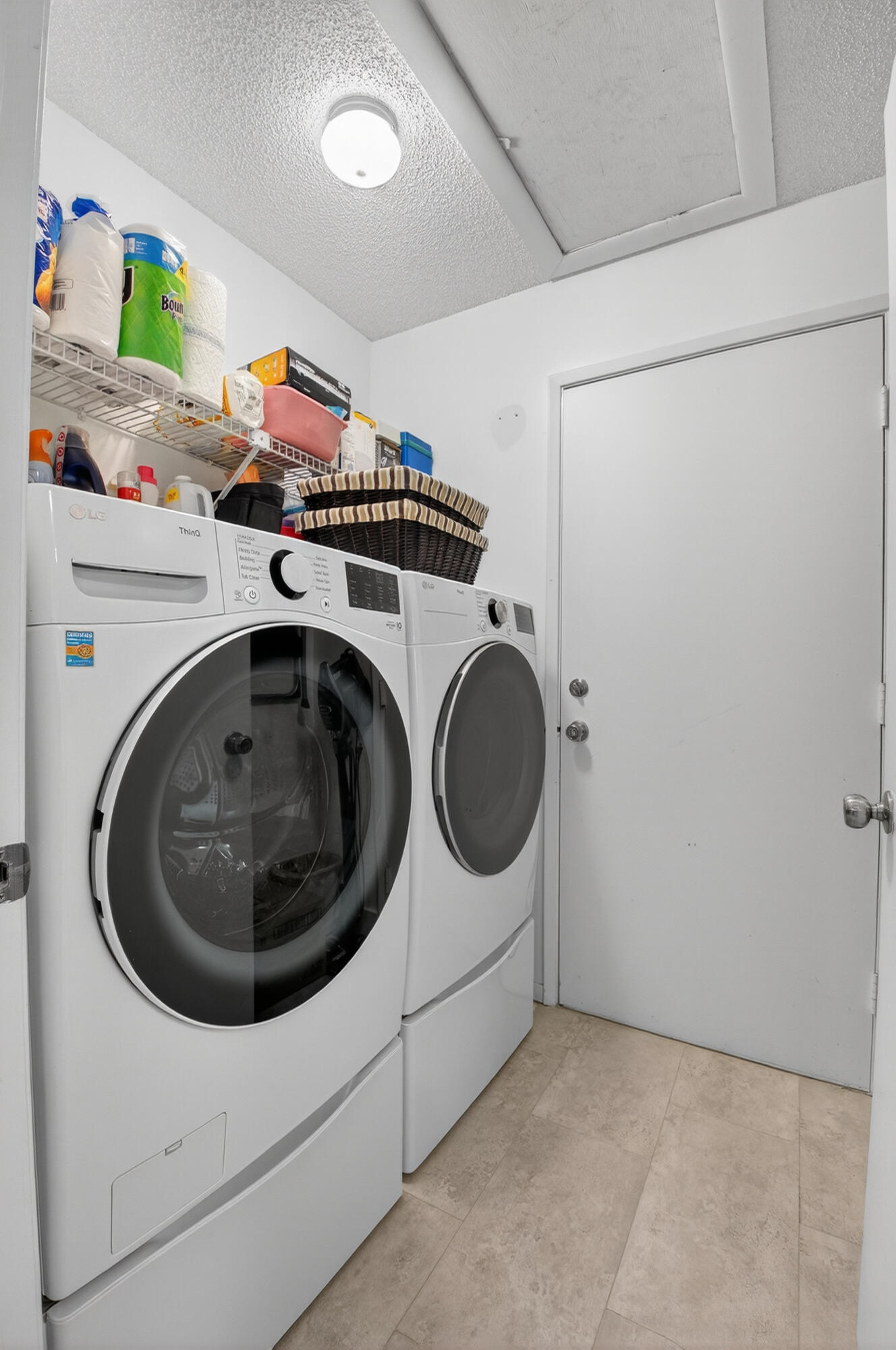 8136 Whispering Palm Drive, Unit B Boca Raton, FL 33496 - Photo 23 of 37 a utility room with dryer and washer