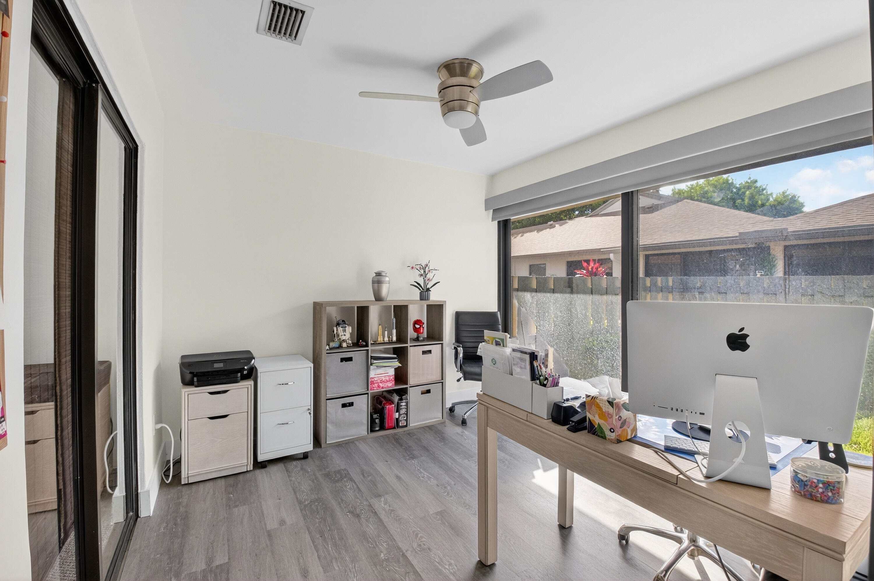 8136 Whispering Palm Drive, Unit B Boca Raton, FL 33496 - Photo 24 of 37 a bedroom with furniture and a window